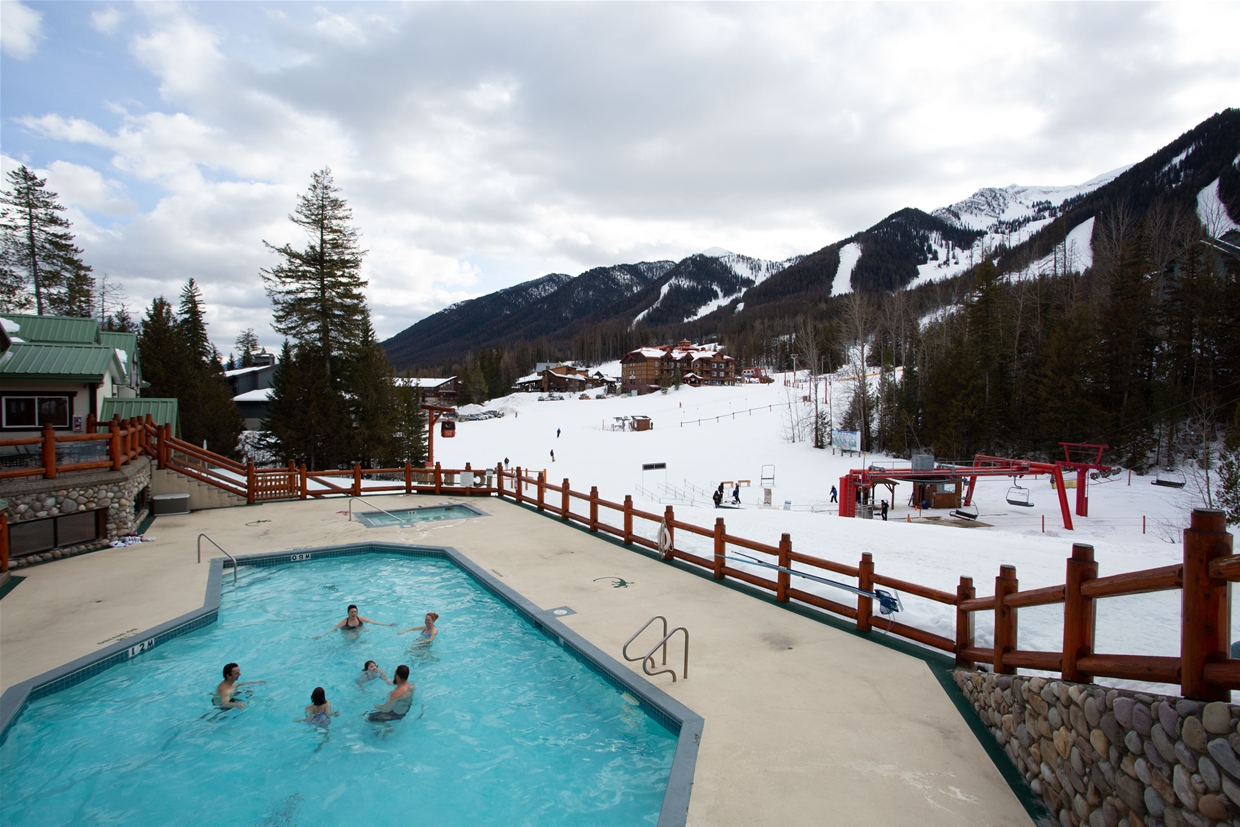 Enjoy the view from the Lizard Creek Lodge's outdoor pool and hot tubs