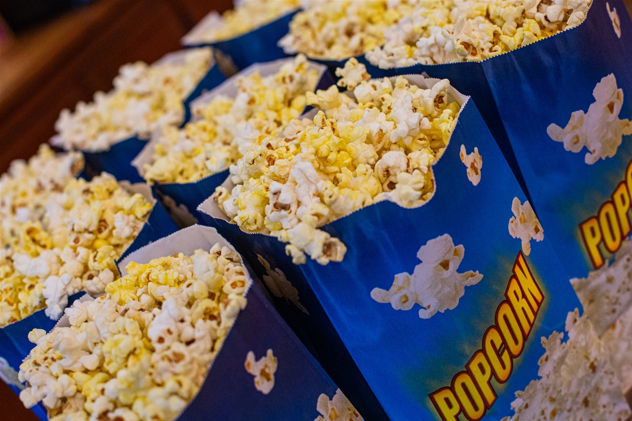 Friday night popcorn delivery service offered to locals by Vogue Theatre