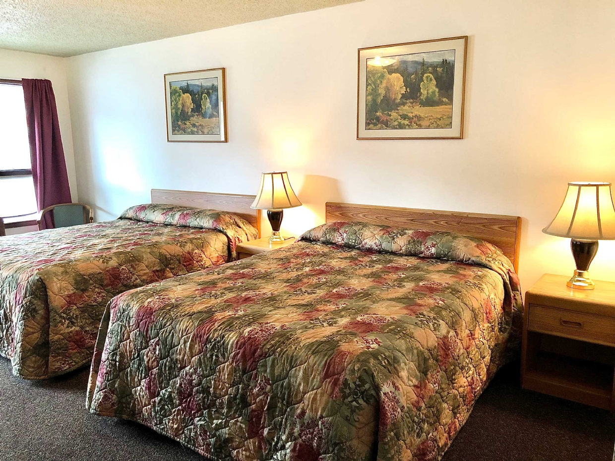 Comfortable Queen size beds at East Kootenay Motel